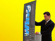 Vinyl banners roll up securely into the base of the Wing's retractable banner system.